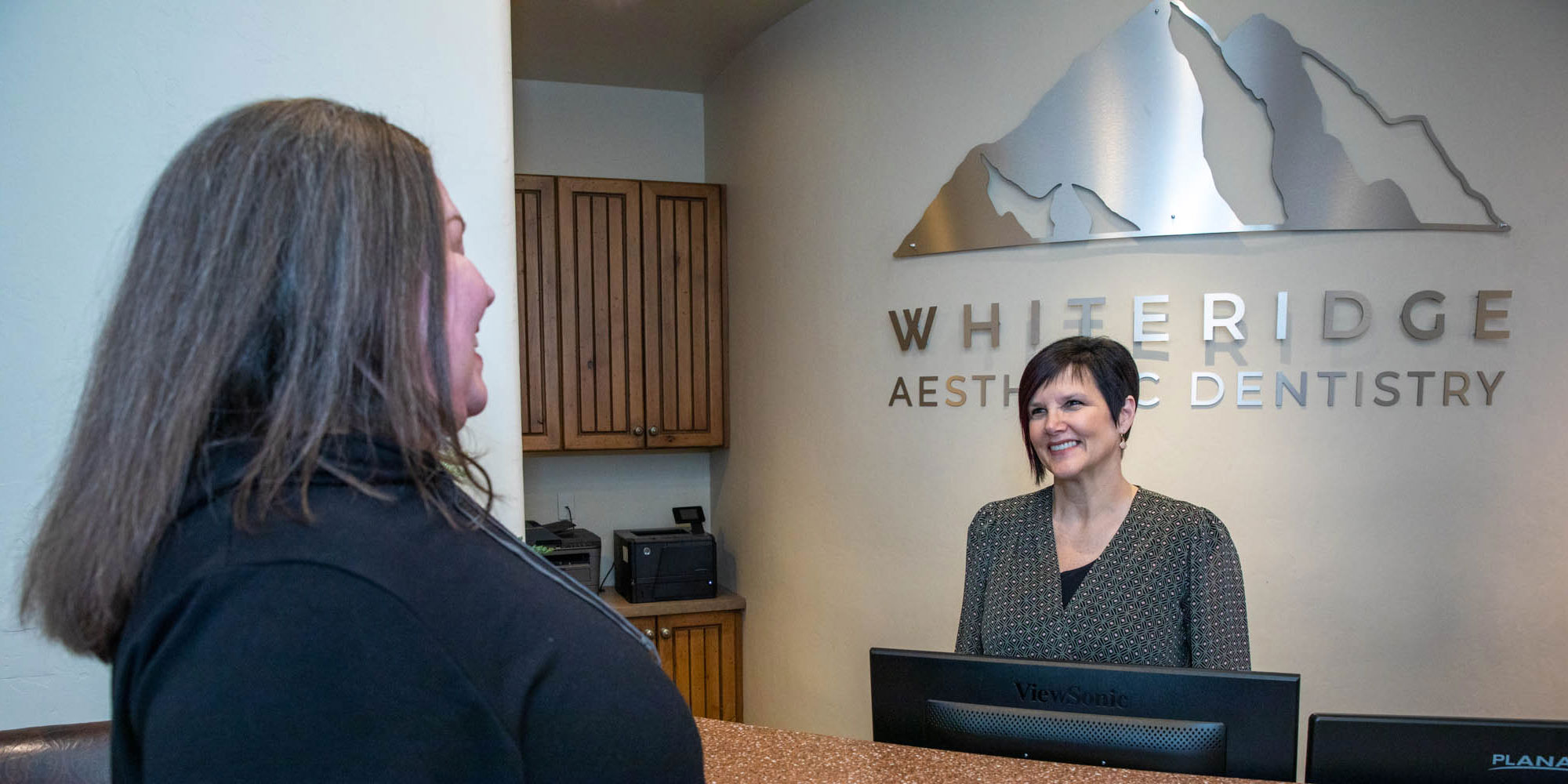 insurance coordinator with kris real dental patient whiteridge dentistry
