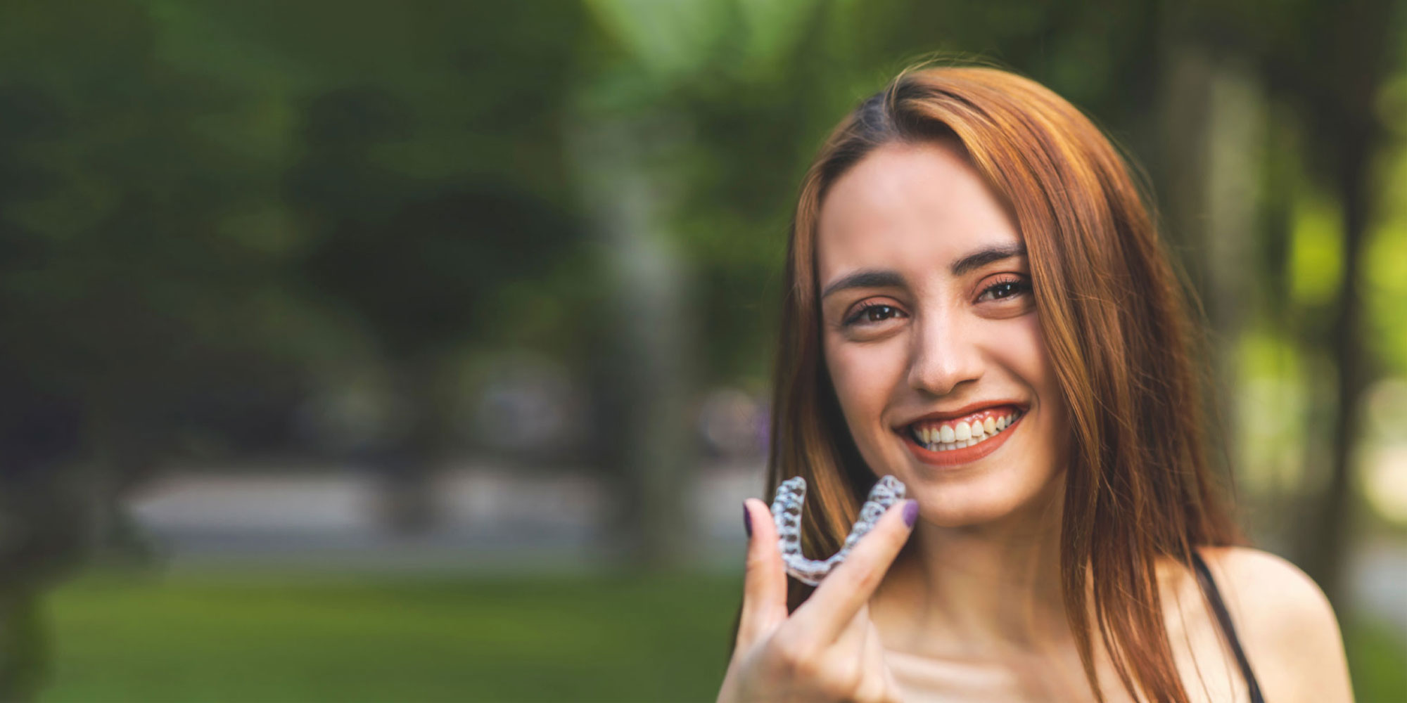invisalign patien with clear aligner