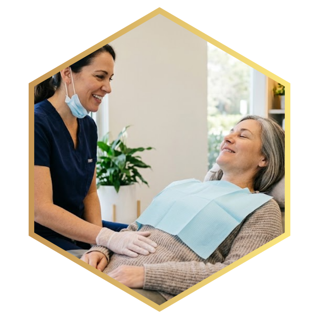 compassionate dentist gently speaking with a deeply relaxed adult patient